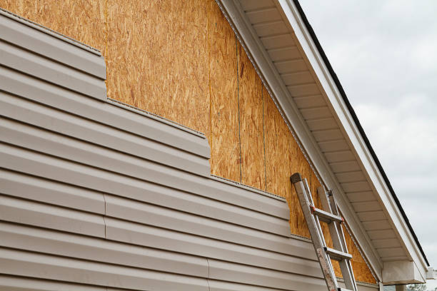 Professional Siding Contractor technician working in East Canton, OH